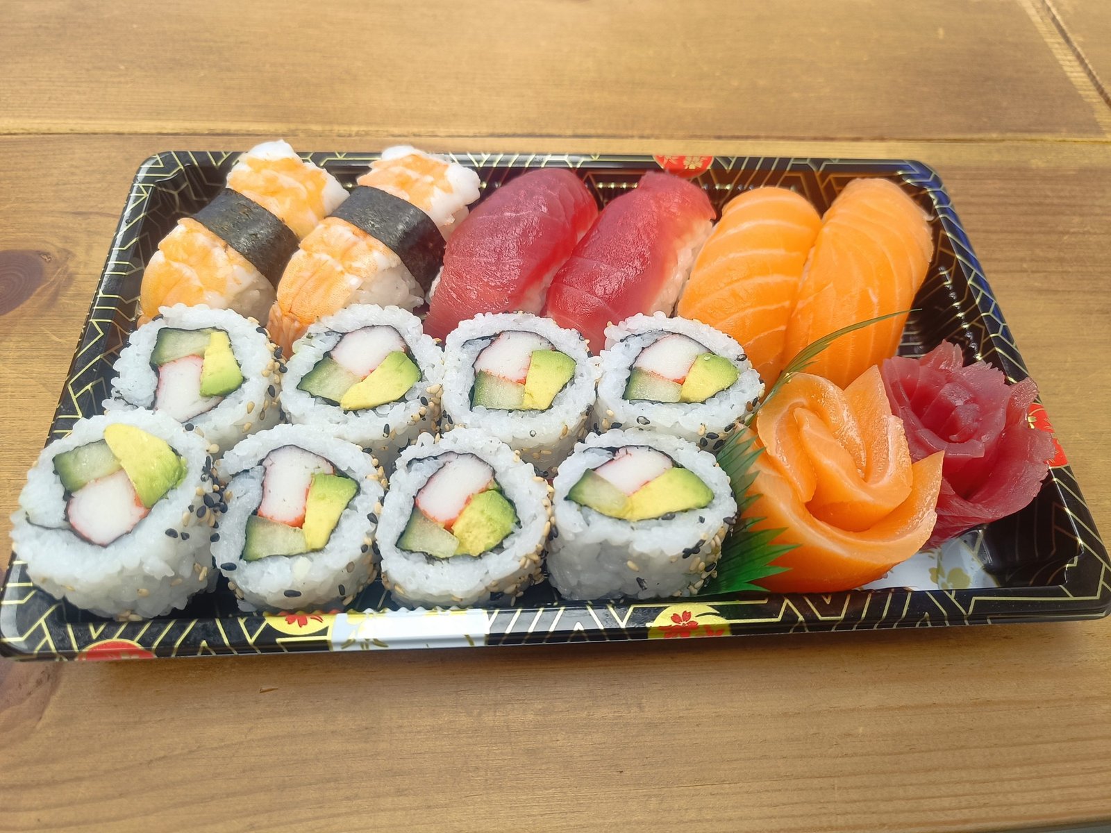 3x Salmon Sashimi 3x Tuna Sashimi 3x Tuna Sashimi 8x California Roll 2x Tuna Nigiri 2x Prawn Nigiri Sesame Seeds