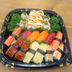 2x Salmon Nigiri 2x Tuna Nigiri 2x Tamago (Omelette) Nigiri 2x Surimi (Crab Sticks) Nigiri 2x Ebi Nigiri (Cooked Prawn) 2x Unagi Eel Nigiri (Cooked) 4x Vegetable Futomaki With Tuna Mayo 8x California Roll Topped With Tobiko (Fish Roe) & Mayo 4x Vegetable Futomaki Topped With Goma Wakame - Seasoned Seaweed