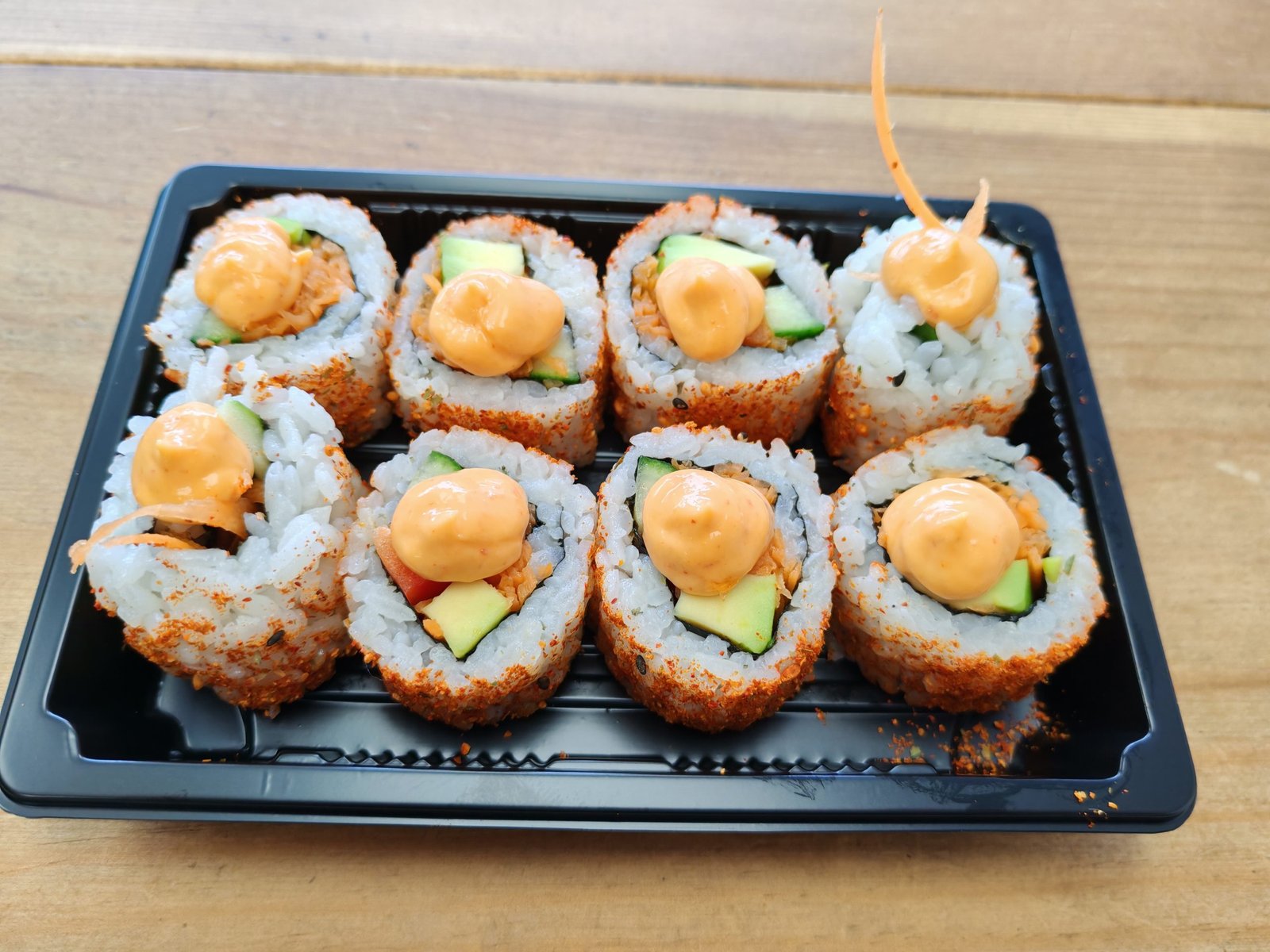 352. Spicy Vegetarian roll Avocado, Cucumber, Carrot, Red Pepper and Spicy Sesame Seeds Topped With Spicy Mayo
