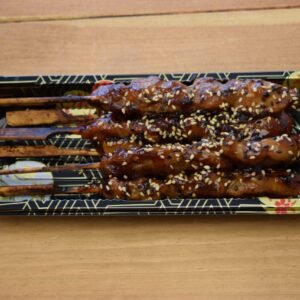Chicken Yakitori (6 Pieces) Skewered Chargrilled Chicken With Teriyaki Sauce & Sesame Seeds.