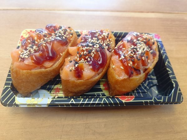 Chopped Salmon Inari - 3 Pieces Rice Inside Fried Sweet Tofu Pouch Topped With Chopped Salmon Homemade Teriyaki Sauce Sesame Seeds