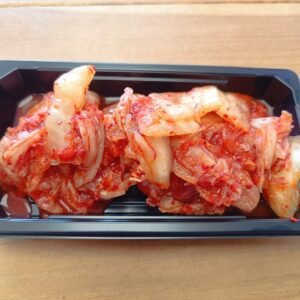 Kimchi Chinese Cabbage, Salt, Garlic, Ginger and Chili. - Spicy, Sour, and Slightly Tangy