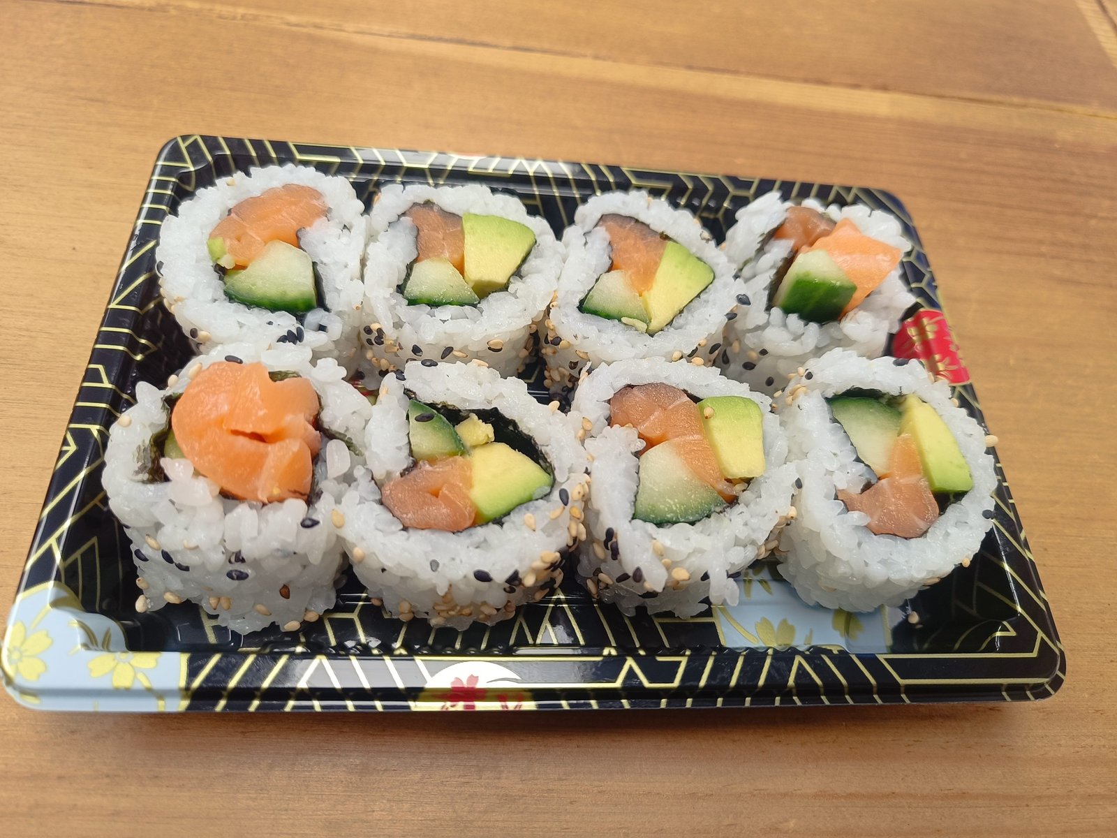 353. Salmon Roll Salmon, Cucumber, Avocado and Sesame Seeds