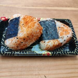 Rice filled with Spicy Tofu (beancurd) Topped with Spicy Sesame Seeds