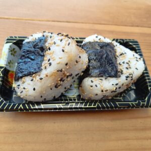 Rice filled with Teriyaki Chicken Topped with Sesame Seeds